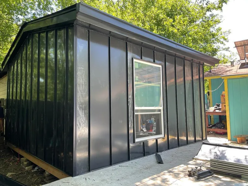 Black standing seam metal wall panels for Roof Inspection in South Salt Lake