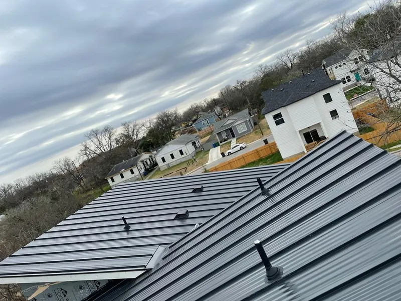 Standing seam metal roof panels with vents for Skylight Repair in South Salt Lake